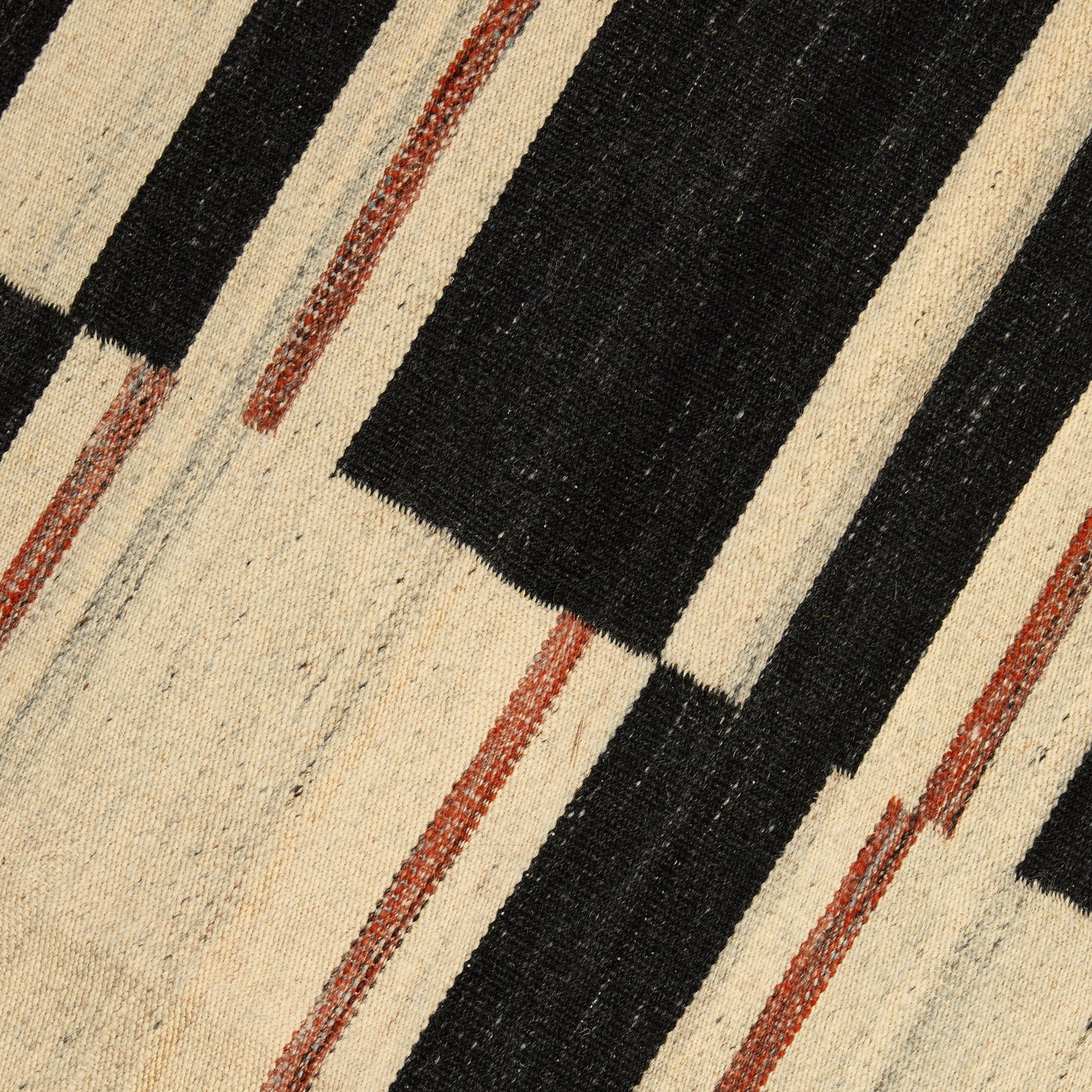 alt handwoven rug | black/cream/rust