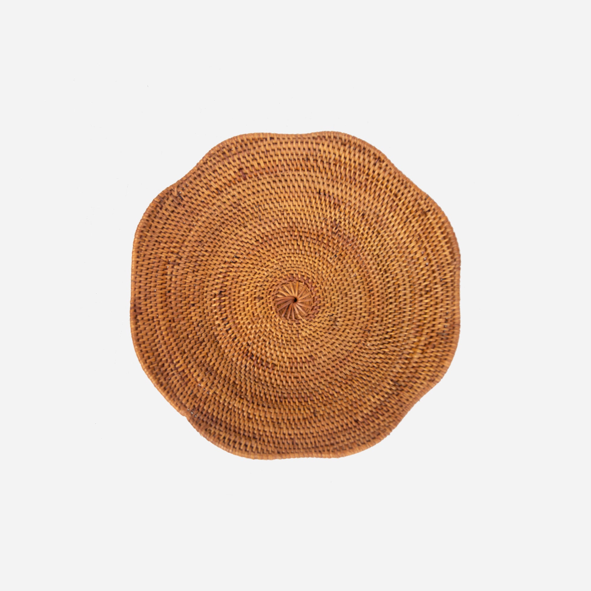 Handwoven atta grass decorative wavy fruit bowl. Handcrafted by artisans for Simpatico.